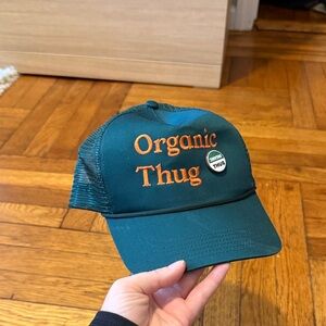 Green Cap with Orange Lettering
